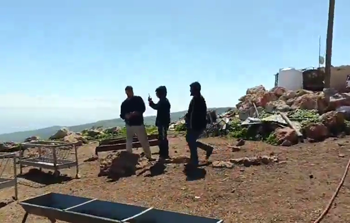 Thumbnail preview image for the video titled: Settlers, armed with a rifle, batons and pepper spray attack Palestinians and solidarity activists in Duma