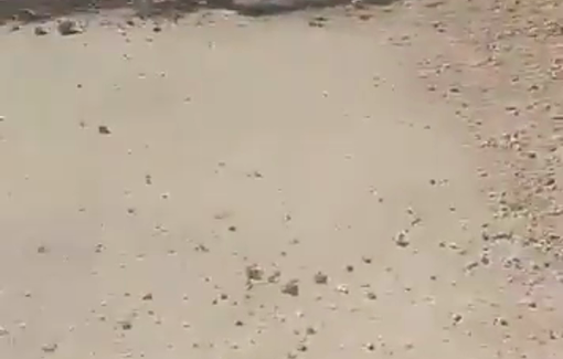 Thumbnail preview image for the video titled: Israeli forces piled up earth mounds at the only entrance/exit of Al Mughayyir village blocking traffic in both directions