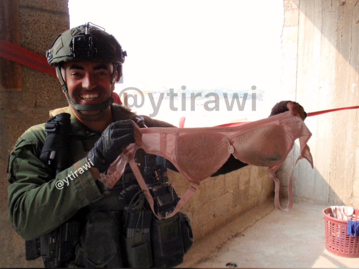 Thumbnail preview image for the video titled: An Israeli First Sergeant from the paratroopers brigade display a bra belonging to a Palestinian woman