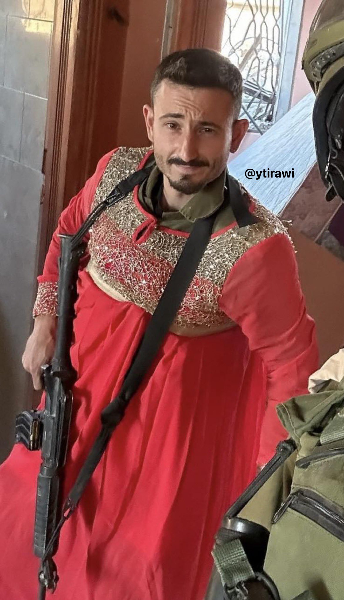 Thumbnail preview image for the video titled: Israeli soldier wearing looted Palestinian women's clothing