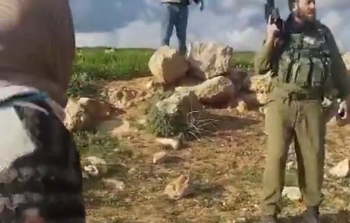 Thumbnail preview image for the video titled: Two Palestinian in Wadi al-Rakeem were shot by a setler in an army uniform invading their land alongside settlers and their flocks