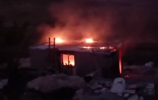 Thumbnail preview image for the video titled: Gangs of settlers set fire to two structures in the village of Halawe in Masafer Yatta