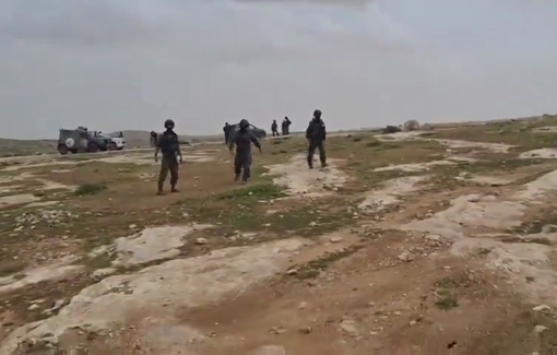 Thumbnail preview image for the video titled: Settlers in uniform are preventing Palestinian shepherds from grazing their flocks, using threats and tear gas