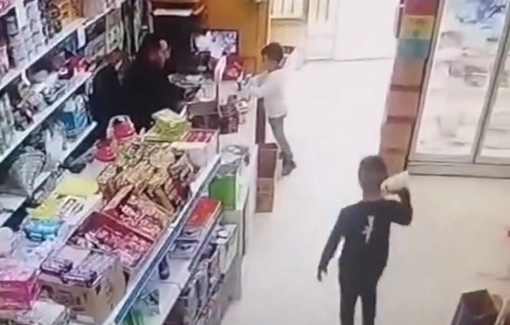 Thumbnail preview image for the video titled: Israeli soldiers strip a Palestinian child of his shirt, assault him, terrorizing him and his family while shopping in Hebron