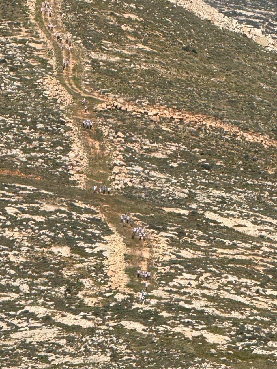 Thumbnail preview image for the video titled: Groups of Israeli settlers gather in the Al-Ulya area near the town of Deir Dibwan to carry out a pogrom in the village