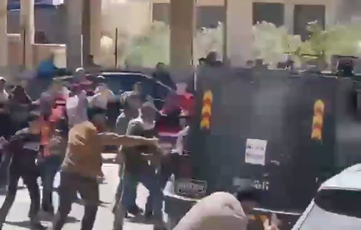 Thumbnail preview image for the video titled: Funeral procession interrupted by military vehicle; Palestinian boy arrested after hitting the jeep