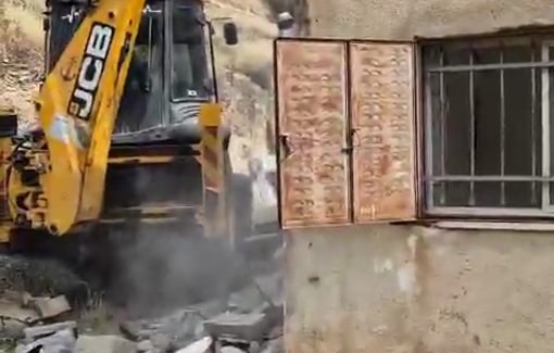 Thumbnail preview image for the video titled: Israeli forces forced resident Awatif Mahmoud Al-Ghoul to demolish her house in the Al-Suwaih neighborhood of Silwan