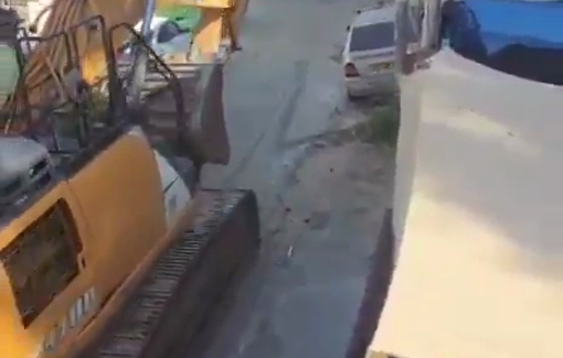 Thumbnail preview image for the video titled: Israeli forces accompanied by bulldozers storm the neighborhood of Al-Bustan in the town of Silwan
