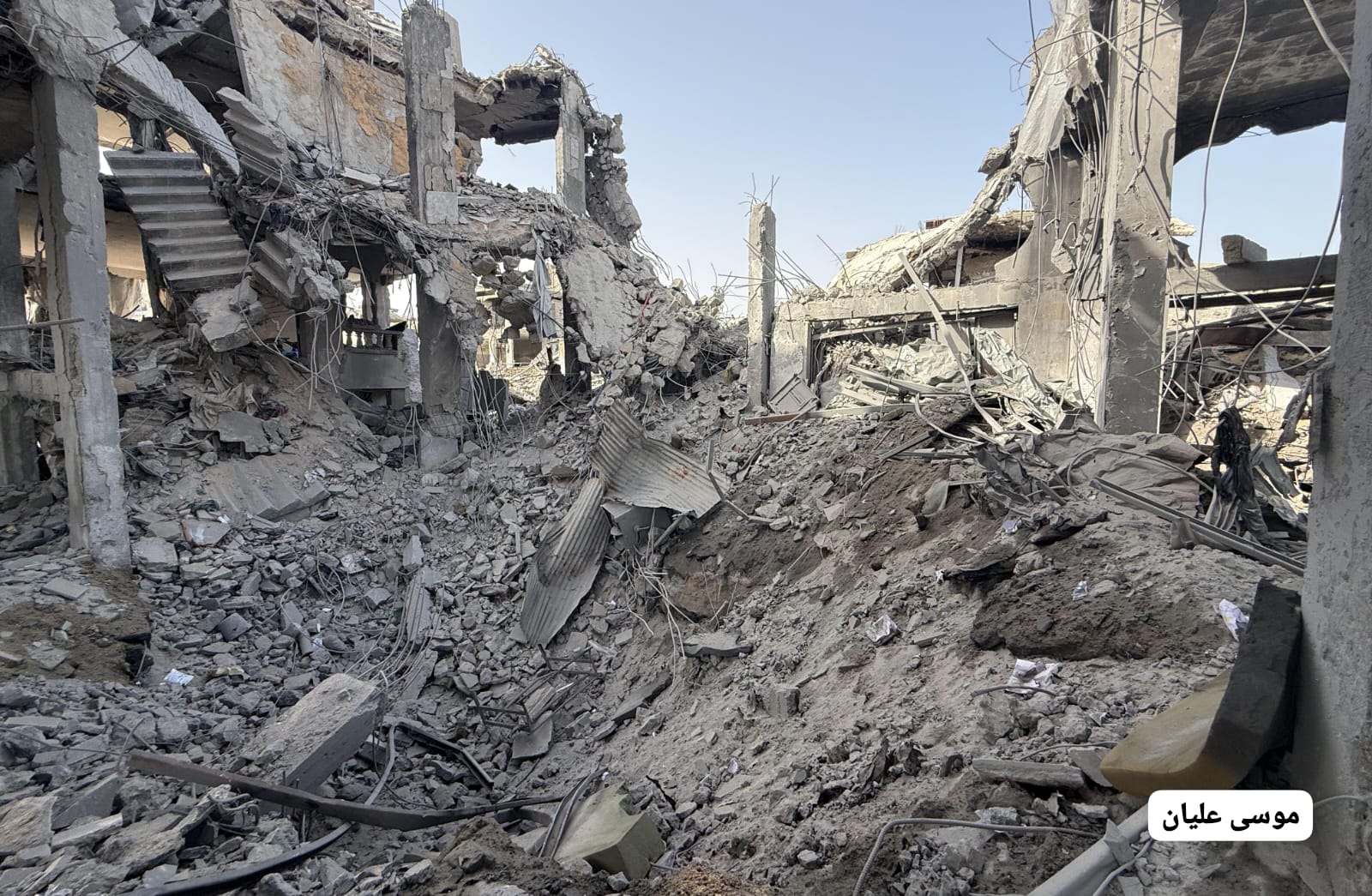 Thumbnail preview image for the video titled: Residential block destroyed by Israeli bombing of Al-Faluja area