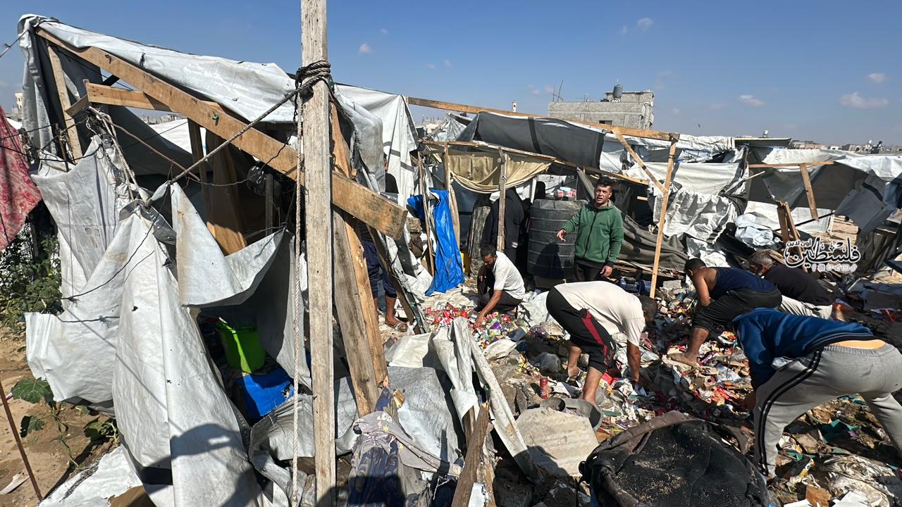Thumbnail preview image for the video titled: Wreckage of tents following Israeli airstrike on tent selling snacks