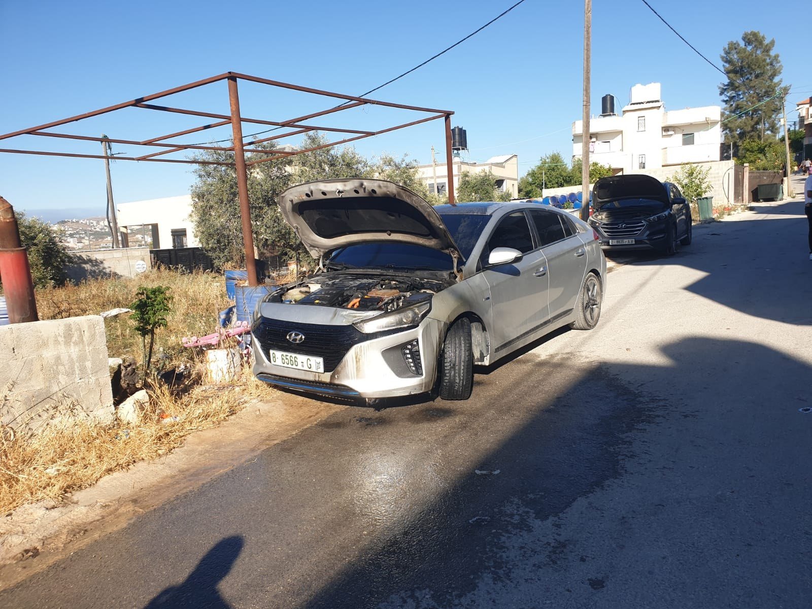 Thumbnail preview image for the video titled: Gang of Israeli settlers destroyed and burned Palestinian-owned vehicles during their attack on the town of Jit