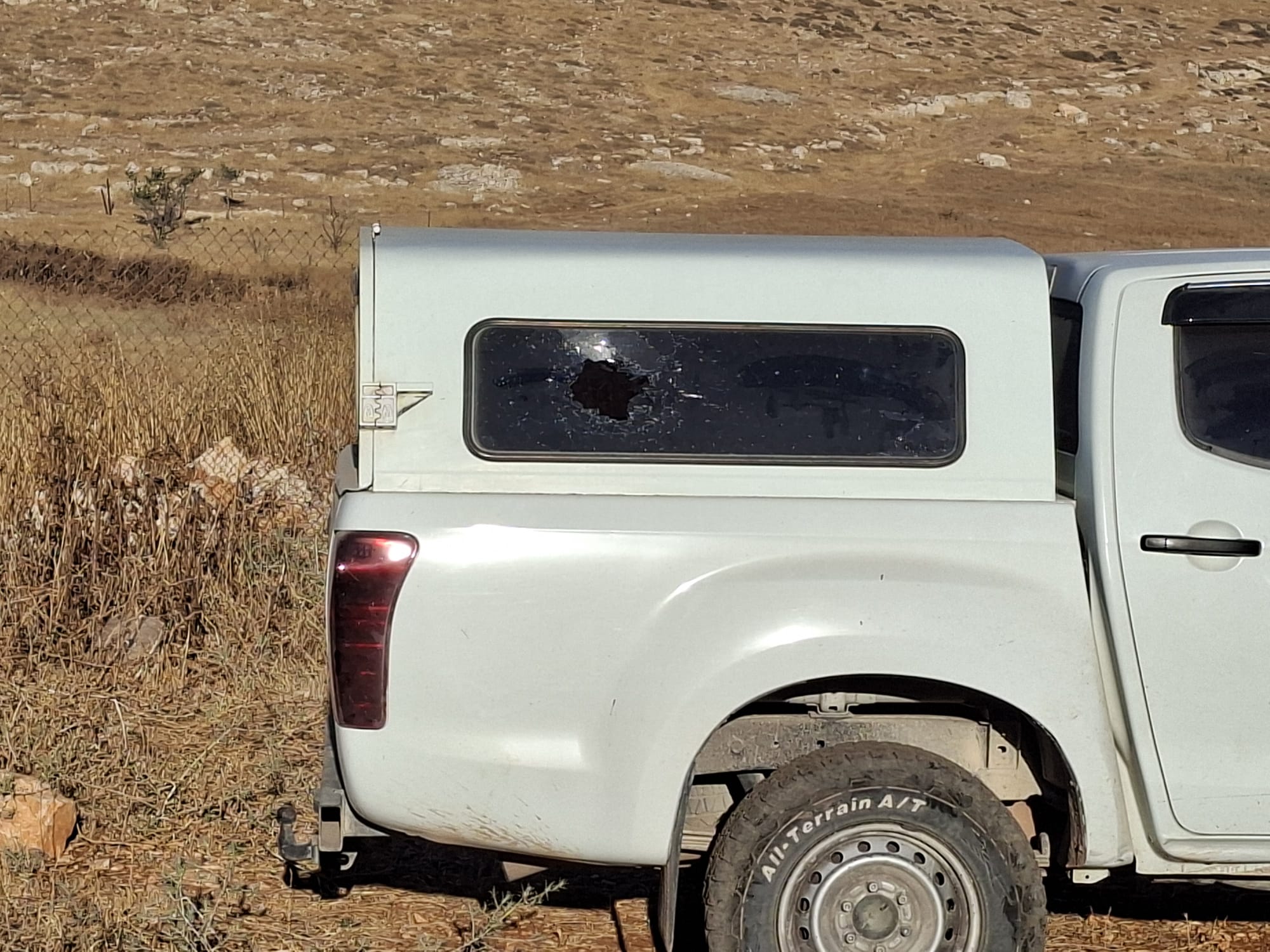 Thumbnail preview image for the video titled: Israeli settlers threw a stone at the vehicle of a protective presence activist near Taybeh