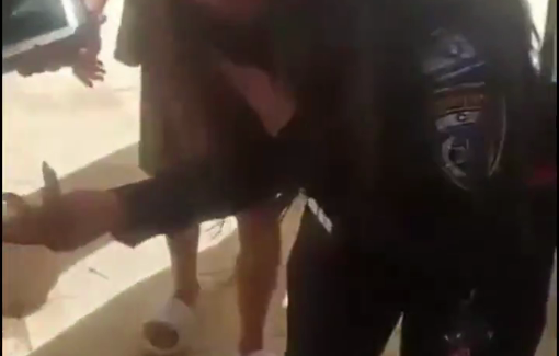 Thumbnail preview image for the video titled: A Haifa municipal inspector repeatedly hits a Palestinian teenager who was just relaxing on the beach