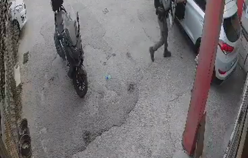 Thumbnail preview image for the video titled: An Israeli soldier deliberately hurled a stun grenade at Palestinian civilians inside their vehicle in Qalandiya RC