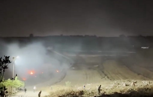 Thumbnail preview image for the video titled: Gangs of settlers, backed by soldiers, fired shots, set fire to crops, and vandalized Palestinian properties in Sinjil