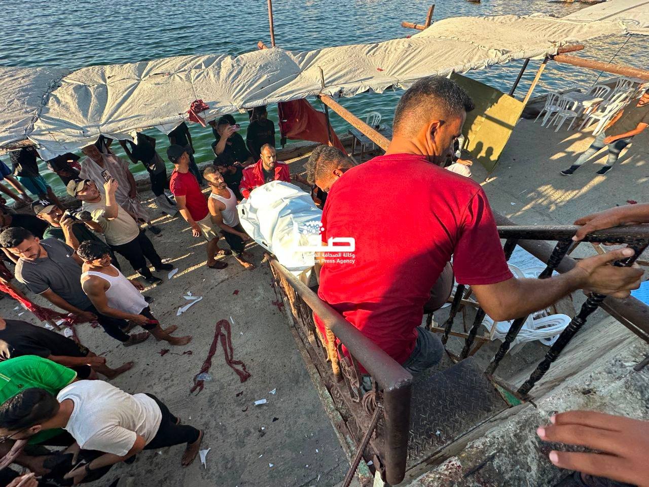 Thumbnail preview image for the video titled: Scene of Israel's massacre at busy Gaza Port cafe