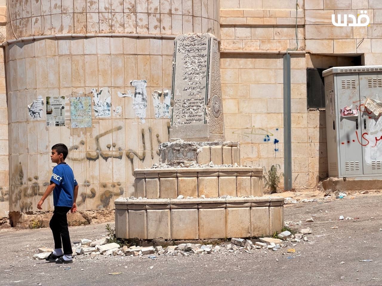 Thumbnail preview image for the video titled: Backed by soldiers, Israeli MK Zvi Sukkot, destroyed the Palestinian Martyrs Monument in Madama