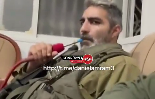 Thumbnail preview image for the video titled: Israeli soldiers in Jenin smoking a looted hookah, while humiliating arrested Palestinian detainees