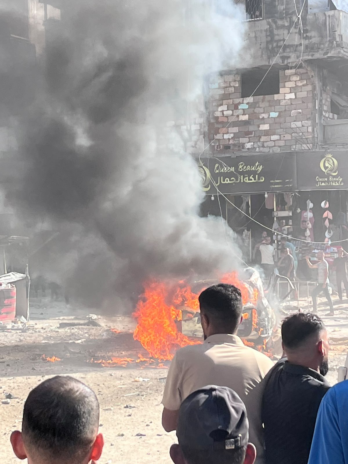 Thumbnail preview image for the video titled: Car ablaze following an Israeli drone strike in Sheikh Rawan