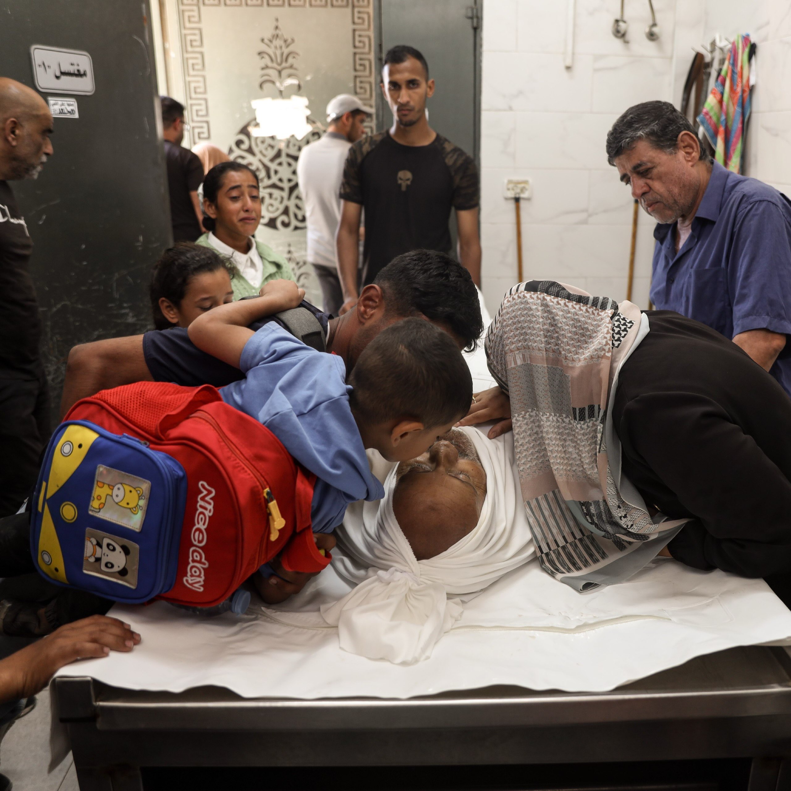 Thumbnail preview image for the video titled: Child and family mourns Palestinian killed by Israeli bombing of his car