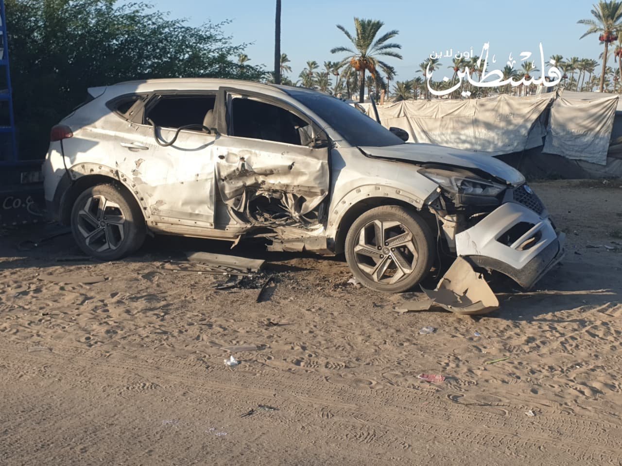 Thumbnail preview image for the video titled: Wreckage of car struck by Israeli drone on Asdaa Street in Khan Younis