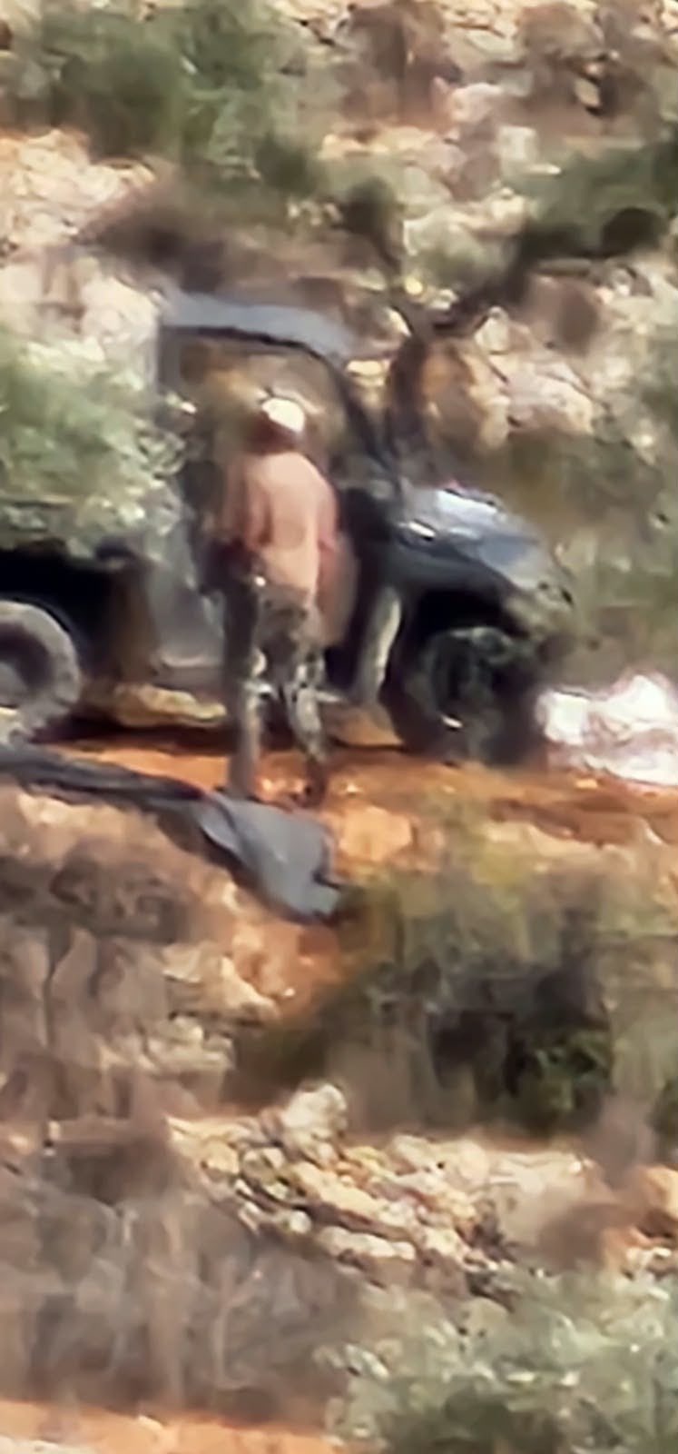 Thumbnail preview image for the video titled: In Awwin, Ramallah Governorate, Jewish settlers steal olive and harvest equipment