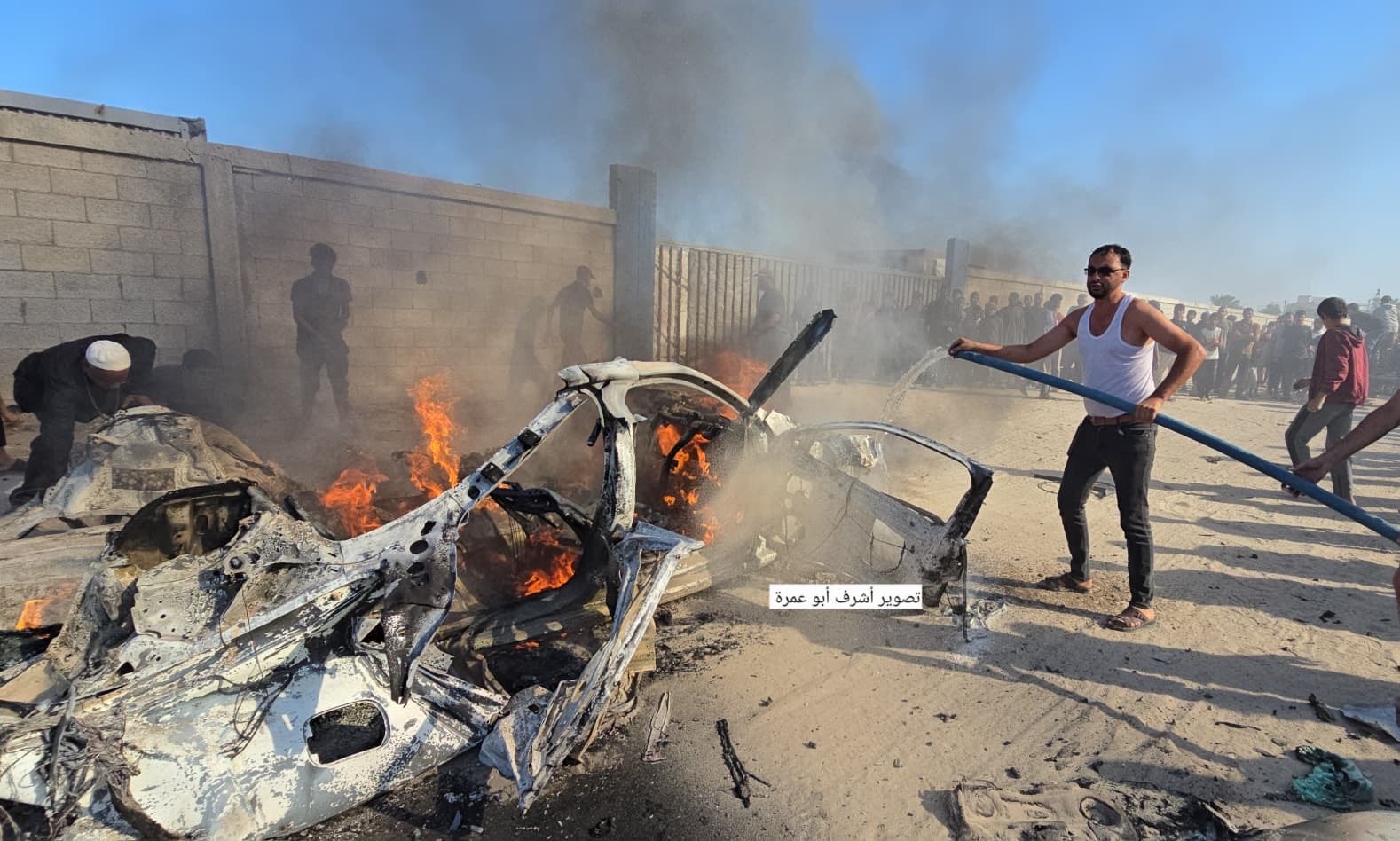 Thumbnail preview image for the video titled: Car of aid coordinator ablaze after deadly Israeli drone strike