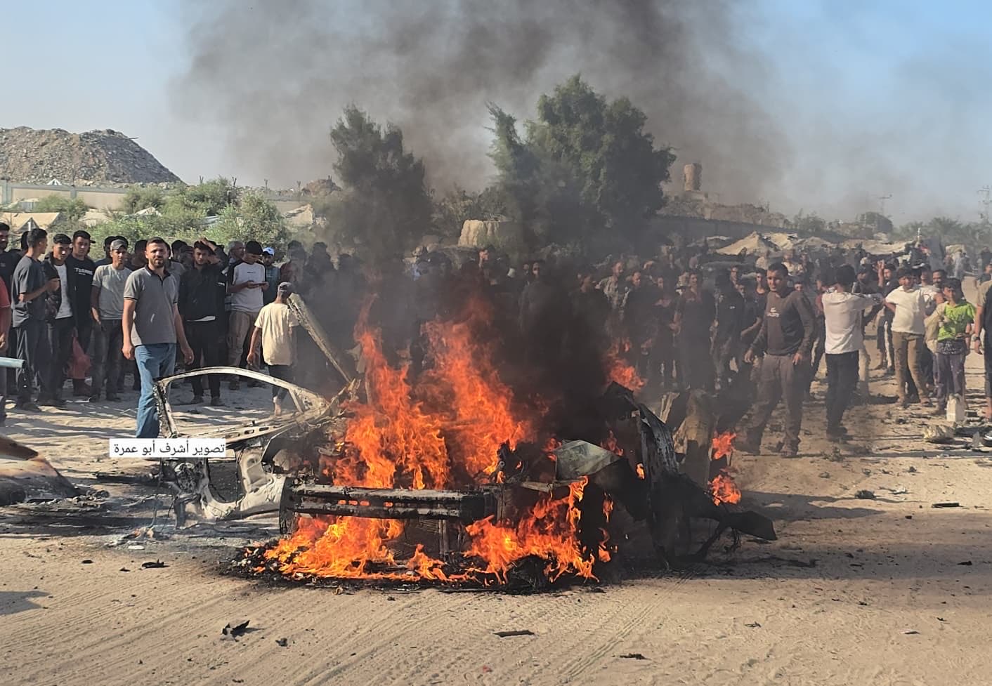 Thumbnail preview image for the video titled: Car of aid coordinator ablaze after deadly Israeli drone strike