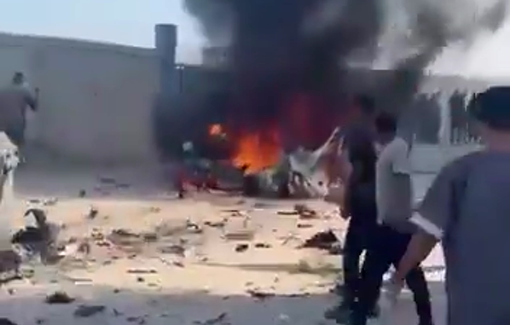 Thumbnail preview image for the video titled: Car of aid coordinator ablaze after deadly Israeli drone strike