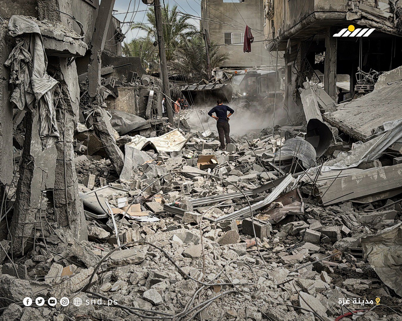 Thumbnail preview image for the video titled: Palestinians inspect what remains of their belongings after late night Israeli bombing of a house in central Gaza