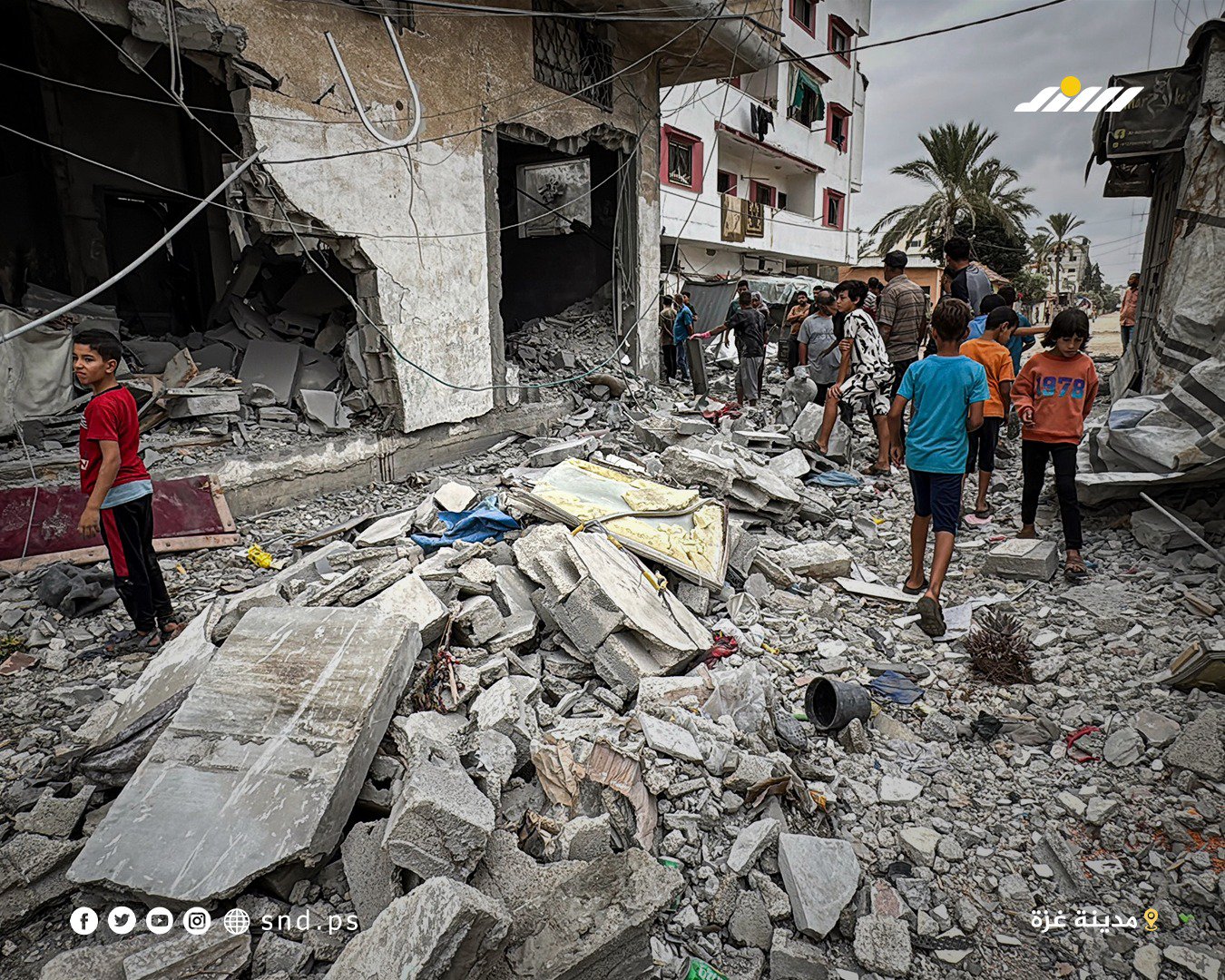 Thumbnail preview image for the video titled: Palestinians inspect what remains of their belongings after late night Israeli bombing of a house in central Gaza