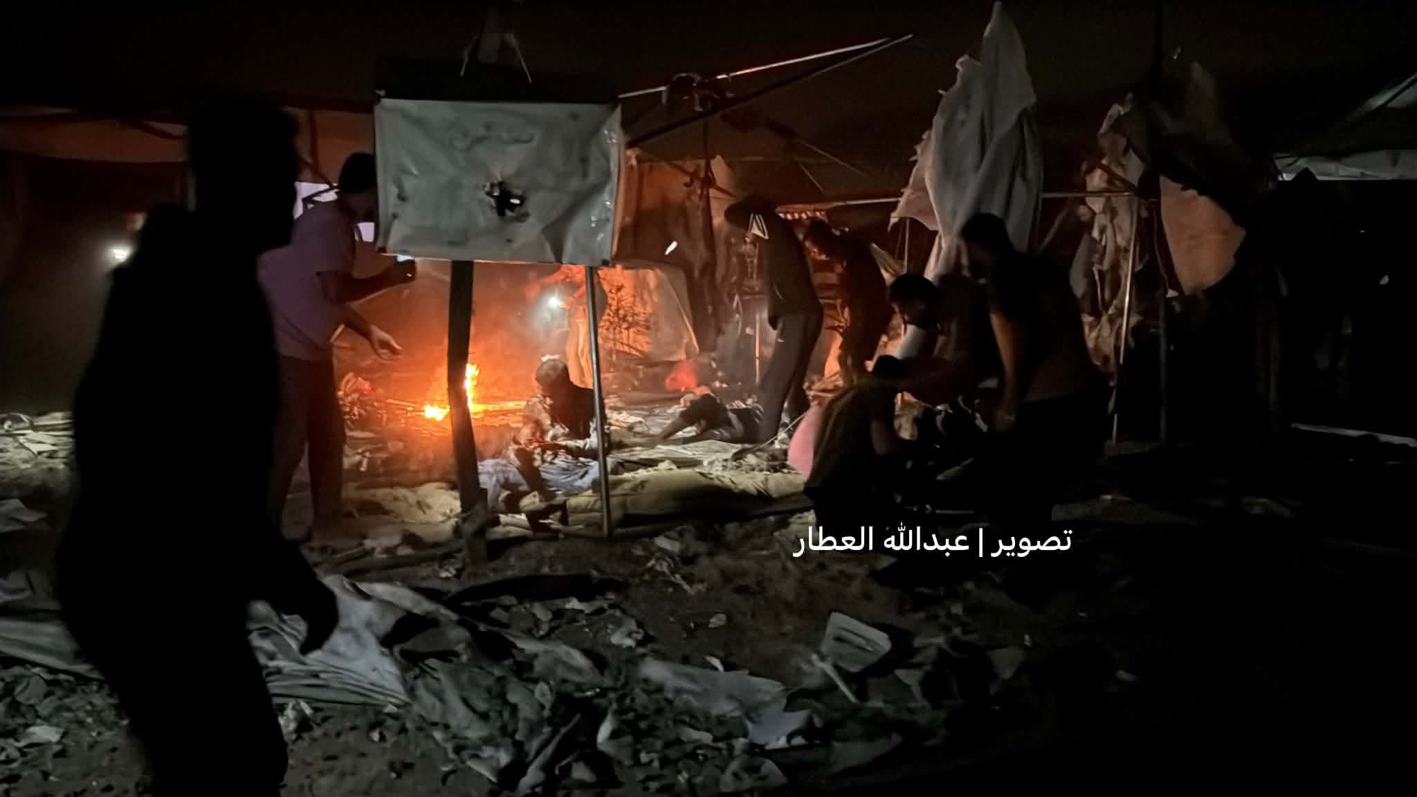 Thumbnail preview image for the video titled: Scene of Israeli massacre of 3 Palestinian in a tent in Khan Younis