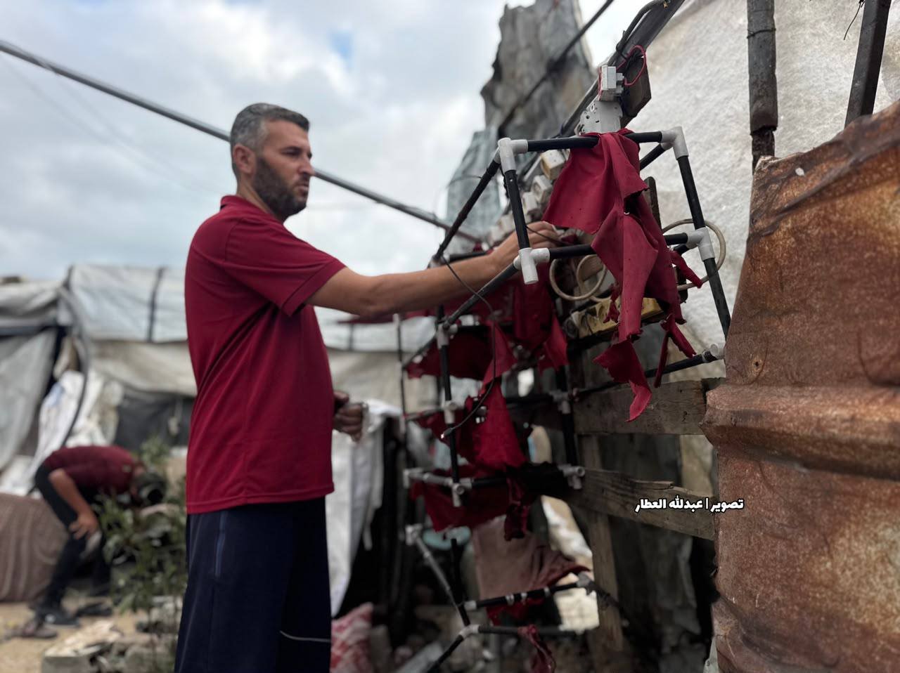 Thumbnail preview image for the video titled: Aftermath of deadly Israeli strike on tent in Khan Younis that killed 3 young men