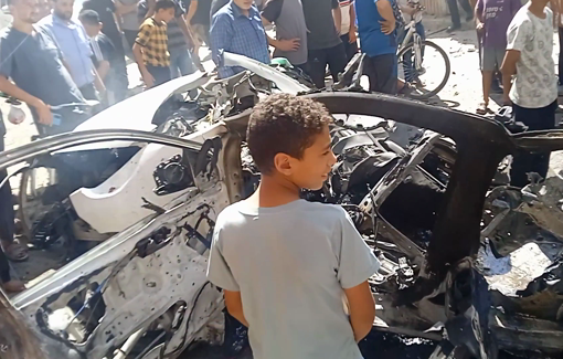 Thumbnail preview image for the video titled: Wreckage of car burnt down in deadly Israeli drone strike in eastern Gaza City