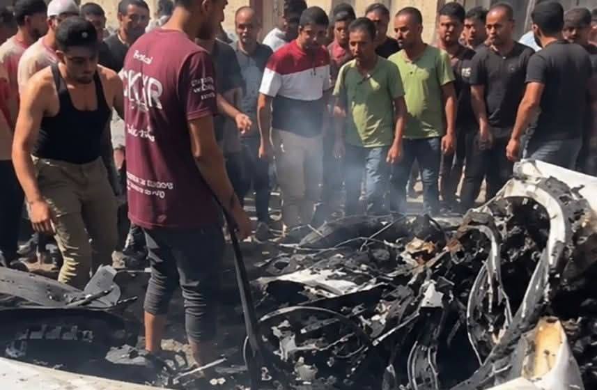 Thumbnail preview image for the video titled: Wreckage of car burnt down in deadly Israeli drone strike in eastern Gaza City