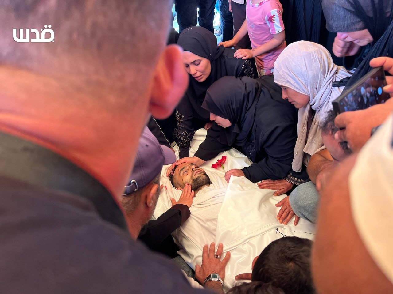 Thumbnail preview image for the video titled: Families mourn Palestinians killed by Israeli drone strike on their car