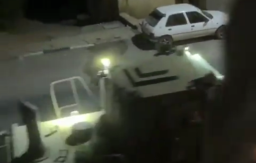 Thumbnail preview image for the video titled: Israeli occupation bulldozers carry the bodies of three Palestinians who were shot in Qabatiya