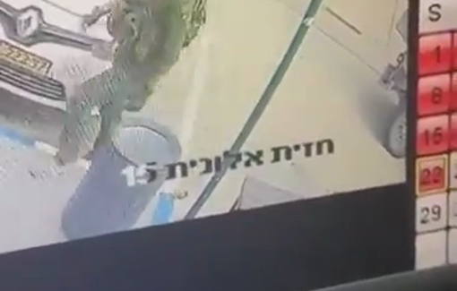 Thumbnail preview image for the video titled: An Israeli reserve soldier punched a young Palestinian simply for playing Arabic music in his car